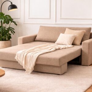 El Sofa Cama Monaco con diseño moderno, confort diario y patas de madera en ambiente de living